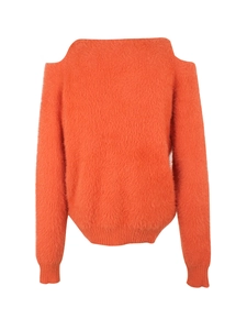 Detailed view of the fuzzy orange off-shoulder knit sweater with ribbed cuffs and hem