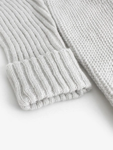 Pull en maille pour femme avec col rond, texture épaisse blanche et poignets côtelés