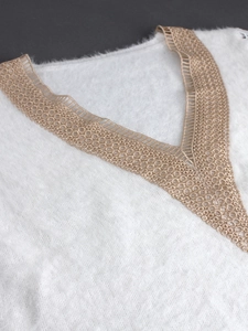 White V-neck knit sweater with golden lace crochet details for women in spring and winter