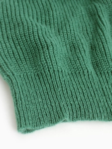 Deep green high neck knitted sweater dress featuring premium rib-knit texture and cuffs