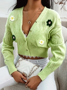 Light green V-neck knitted cardigan featuring 3D floral accents and round buttons
