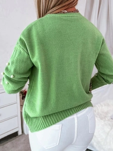 Grass green knit cardigan set with pearl sleeve accents shown from the back on model