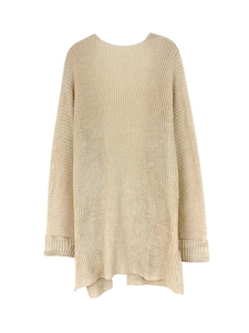 Detail view of cream oversized knit cardigan with vertical ribbed texture and wide cuffs