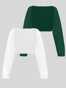 Close-up of knit cropped shrug bolero showing forest green and white textures and stitching