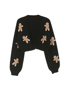 Detail of cropped black V-neck cardigan with cute gingerbread man embroidery patches
