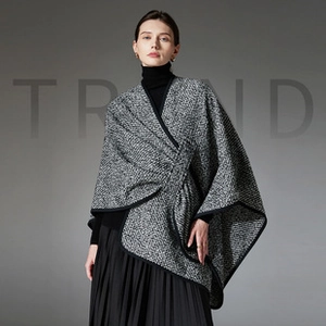 Detail of elegant tweed texture and black edging on this stylish wrap shawl for women