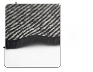 Detail view of woven grey and black striped fabric with thick black edge binding process
