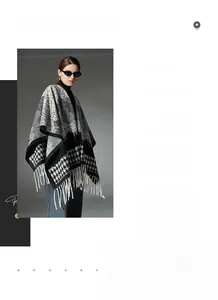 Detailed view of houndstooth wool shawl with elegant fringes and landscape pattern