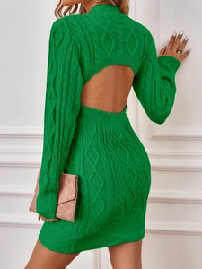 Detail view of cable knit green dress with elegant open back design and slim fit cut