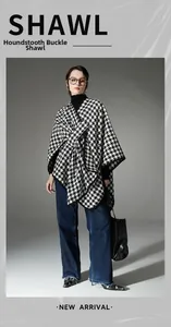 Detail of houndstooth buckle shawl in black and white tweed fabric for women