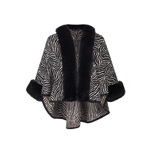 Women's black and white zebra pattern shawl poncho with thick black faux fur collar and cuffs