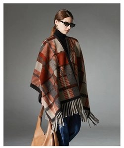 Detailed view of camel plaid wool shawl with fringe tassels for autumn and winter outfits