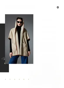 Close-up of hooded plaid cloak featuring double pockets and Nordic minimalist design