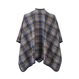 Detail of classic navy and brown plaid pattern with durable black piped edges on a wrap