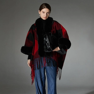 Winter red and black plaid poncho with faux fur trim and fringe detail for women