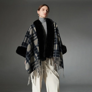 Navy blue plaid shawl cape with faux fur collar and fringe hem for autumn winter