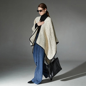 Elegant beige tweed poncho with black trim and gold metallic thread for women