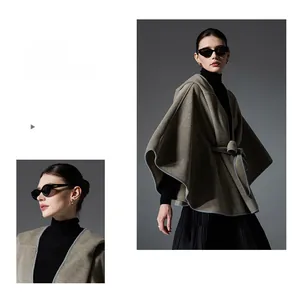 Detail view of light coffee hooded poncho featuring contrast grey trim and waist tie