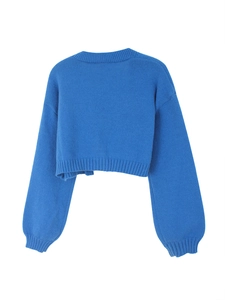 Detailed view of royal blue cropped knit cardigan featuring ribbed cuffs and neckline
