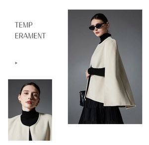 Detailed texture of beige cashmere cape shawl with elegant collarless open-front design