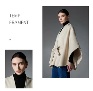 Detail of a beige belted wool-blend poncho wrap coat featuring a stylish waist tie