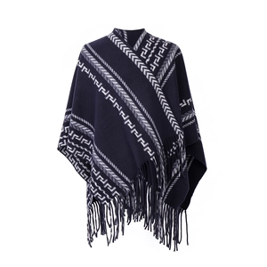 Navy blue knit shawl with white geometric Greek key patterns and fringe trim for autumn