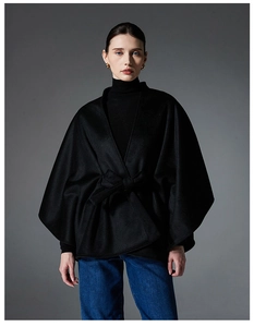 Chic black double-sided wool shawl coat featuring a waist belt and oversized silhouette