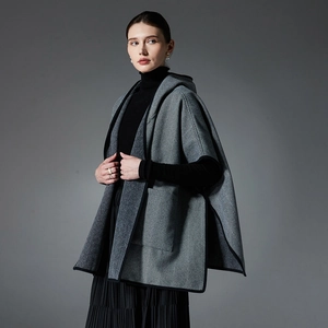 Elegant grey herringbone hooded poncho shawl for women featuring black contrast trim