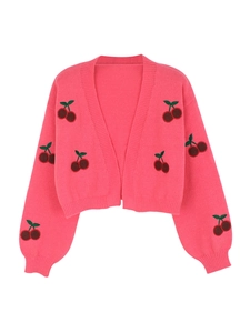 Detail of pink cropped cardigan with 3D cherry embroidery and rib-knit cuffs