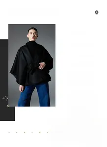 Détail d'une cape en laine noire avec ceinture au style scandinave minimaliste et élégant