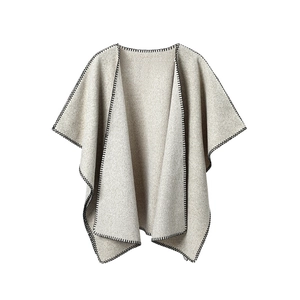 Oatmeal wool cloak shawl with black contrast blanket stitching and open front design
