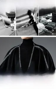 Detail of high neck black knitted poncho with distinctive white contrast stitching