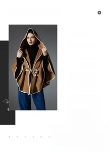Detail of camel wool hooded shawl with contrast white piping and waist tie belt