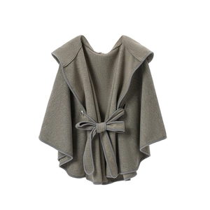 Elegant grey hooded wool cape coat with oversized bow belt and contrast piping