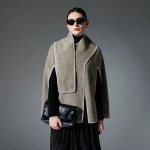 Women's khaki wool blend poncho cape with white whipstitch detailing and open front style