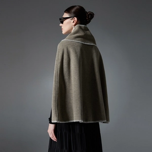 Elegant deep moss green wool shawl cape with white stitching detail for autumn fashion