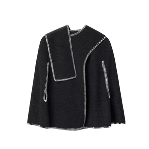 Black wool blend poncho with scarf featuring white contrast blanket stitch detailing