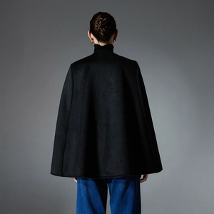 Elegant black double-sided wool sleeveless cape coat for women in a stylish poncho silhouette