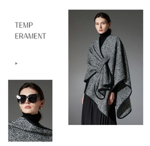 Close-up of thick bouclé wool shawl with black piping and high-end tweed texture