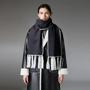 Winter black and white contrast scarf with white stitching and long fringes for women