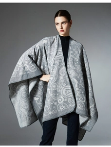 Detailed paisley pattern texture on high-quality wool blend women's crisscross shawl