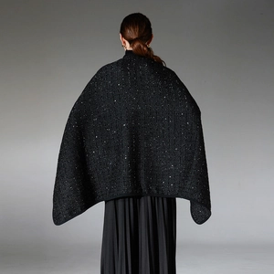 Elegant black sequin wool shawl for women featuring a shimmering texture and draped back view
