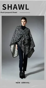 Detailed close-up of high-quality faux mink shawl with black and white jacquard pattern