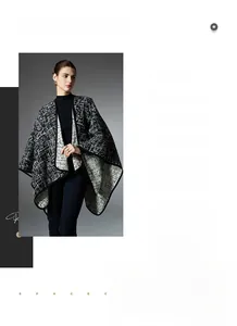 Close-up of elegant black and white plaid pattern on women's faux mink cape with black trim