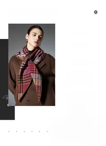 Detail of multi-color plaid 100% wool shawl with vintage knit texture and warm autumn tones