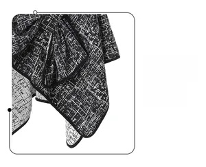 Detailed close-up of high-quality black and white textured knit fabric with smooth hem finish