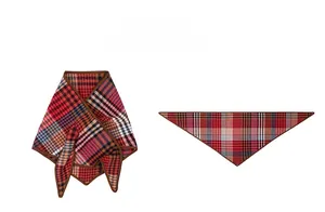 Detail of red and brown plaid wool triangle scarf showing fabric texture and fine stitching