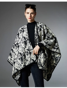 Detail of knitted shawl with black and white ink painting marble texture and border