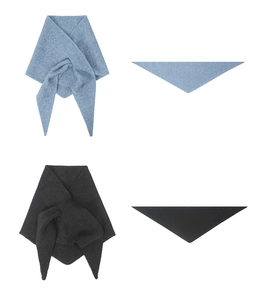 Detailed view of soft knit triangle scarves in light blue and charcoal grey tones