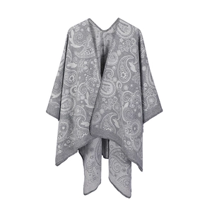 Gray paisley wool-like poncho cape for women featuring an intricate jacquard knit pattern